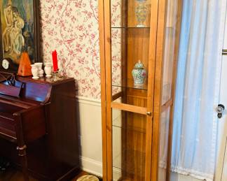 nice tall curio cabinet
