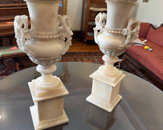 Pair of marble flowered urns