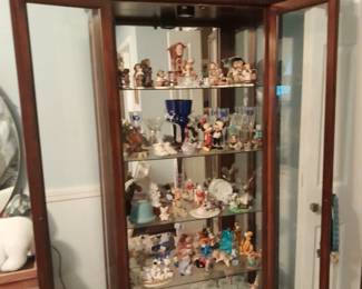 Curio cabinet with collectibles