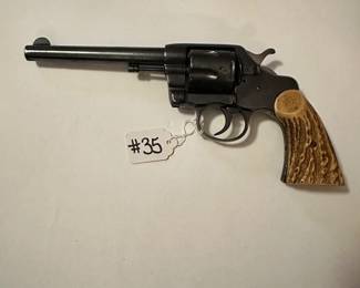 #35 Colt DA38 Army model 19 oh1 with stag handles in good condition