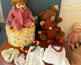 Vintage doll and vintage children’s clothing 