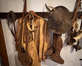 Buckskin pants , shirt , and boots 