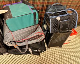 more luggage and backpacks