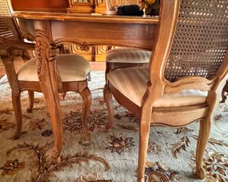 Pecan dining set with caned back chairs
