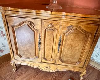 Burled walnut credenze that matches the dining set