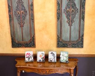 sofa table with Queen ann style legs plus some very nice pieces of art