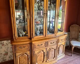 Gorgeous Breakfront in a pecan color with burled walnut inlays