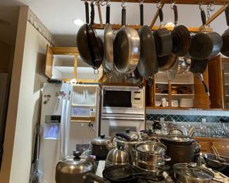 MANY kitchen items and entertainment pieces, including dishes, flatware, appliances, Tupperware, Circulon cookware, variety of glassware, vases, plates, bowls, kitchen tools, etc.