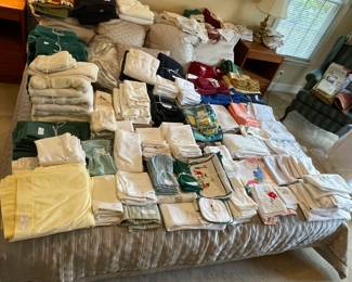 linens, towels, tablecloths, beautiful lace table cloths from Belgium (Belgian tablecloths not shown in this photo)