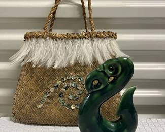 FTH190- Ceramic Sculpture Of The Manaia Fish Hook Together With Woven Bag