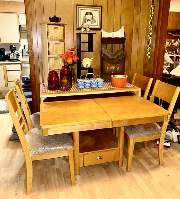 Ashley Dining room table with 4 chairs and one leaf, shelves, vintage wooden magazine rack