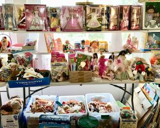 Lots of collectible dolls, many Barbie Dolls NIB and many totes filled with Barbie Dolls, etc.
