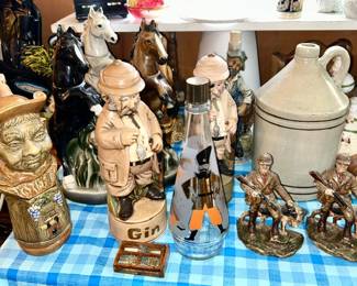Collectible decanters, 1 gal stoneware jug, Hunting figurines, etc.