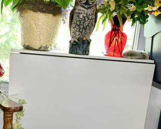 folding sewing/craft table, silk plants, plastic owl figure
