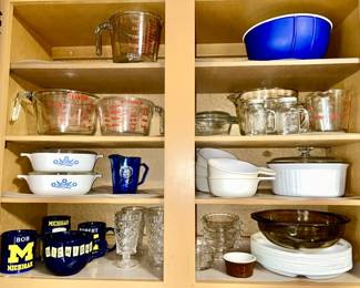 Pyrex measure cups, corning ware, University of MI cups, etc.