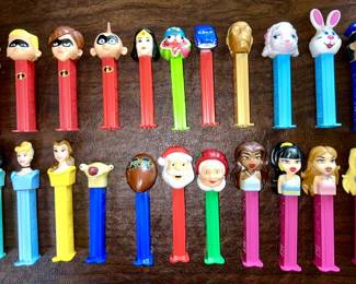 Many vintage PEZ dispensers