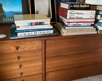 Dresser   And a large  assortment of books 