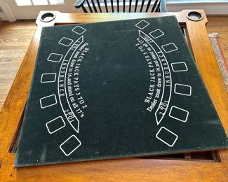the underside of the checkerboard has a black jack board