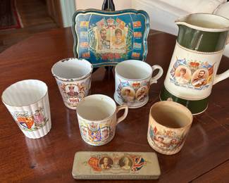 Lot #92 - $75 -Set of 5 mugs, pitcher, metal tray and metal box commemorating the 1911 coronation of Queen Mary and George V and the Silver Jubilee