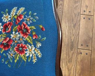 Detail of side chair with a little different stitching toward the front of the seat