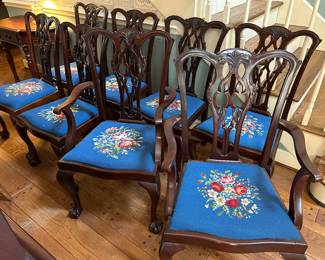 Lot #8 - $900 -set of 8 Chippendale style dining chairs with needlepoint seats. 2 armchairs and 6 side chairs. One side chair has some cosmetic issues. Please see photos.