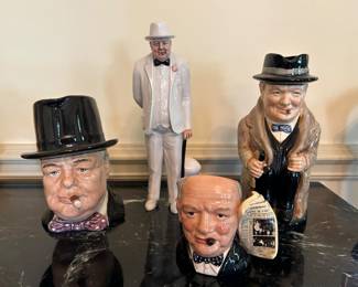 Lot #89 - $250- Group of 4 Royal Doulton Winston Churchill mugs and pitchers.10-1/2", 9", 6-1'2" and 4" High