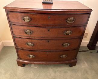 Lot #33 - $450- 4 drawer bowfront mahogany chest. 33"H x 33-1/2"W x 20"D
