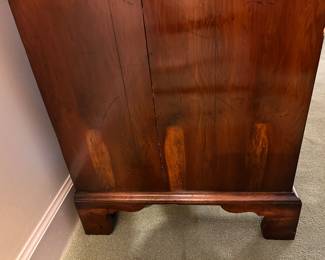 Detail of figure in wood on side panels