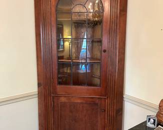 Lot #4 - $395 -Antique corner cabinet with leaded window. 87"H x 40"W x 2' D (to corner of walls. The cabinet is not that deep, but that is how far it stands from the corner)