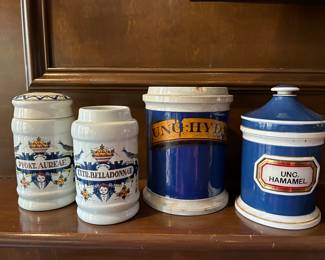 #Lot #159 - $200- Set of mismatched apothecary jars. One with a chip and broken lid. Large blue one with no lid 1790. The tallest is 6”H