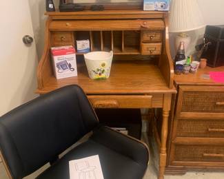 Mid century modern(Reproduction)
Swivel chair like new  and
Scroll top desk