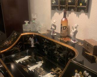 The most amazing and gorgeous piece of Asian furniture I have ever seen
Black Laquered  inlaid with mother of pearl desk