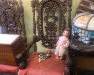 ORIGINAL ARMCHAIR THAT MRS. FISHER SAT UB WITH HER 7 FISHER SONS SURROUNDING HER.  A HIGHLY CARVED ARMCHAIR WITH THE FADED GILT PAINTED ORIGINAL COLORS.