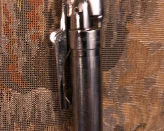 CLOSE UP VIEW OF A RARE PEN LIGHTER THAT WORKS.