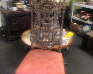 ORIGINAL HAND CARVED ORNATELY CARVED SIDE CHAIR (ONE OF 2 A PAIR).  CIRCA 1931 AND WERE ORIGINALLY GILT GOLD HIGHLIGHTS PAINTED, GOLD, RED & GREEN HIGHLIGHTS 