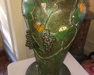 CLOSE UP VIEW OF RARE CHINESE MUSEUM QUALITY SOLID BRONZE PALACE URN WITH CARVE CRAPES & FLORAL DESIGNS.  HEIGHT 32" AND VERY HEAVY UB WEIGHT.  SIGNATURE AT BASE. FAMILY ORIGINAL PURCHASED IN CHINA FOR A WEDDING PRESENT IN THE 1890'S. 