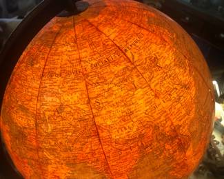CLOSE UP VIEW OF ELECTRIC LIGHTED GLOBE WITH BULB A VERY RARE VINTAGE REPLOGLE GLOBE THAT LIGHTS UP WITH SWITCH AND ORIGINAL MANUAL