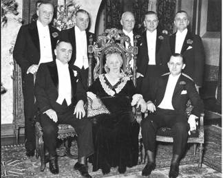 ORIGINAL FAMILY PHOTO TAKEN AT THE LAWRENCE FISHER MANSION IN DETROIT WITH THE SEVEN 7 FISHER FAMILY SONS AND MOTHER.  THIS ORIGINAL FAMILY PHOTO WITH MRS FISHER SEATED IN THIS ARMCHAIR AND 2 OTHER ARMCHAIRS IN A SET ARE AVAILABLE FOR THIS SALE !                                            