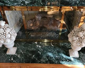 Fruit bowl statues for sale, but not the stunning green marble surround!