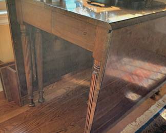 Hard to tell in photo, but both sides flip up to make a large table!