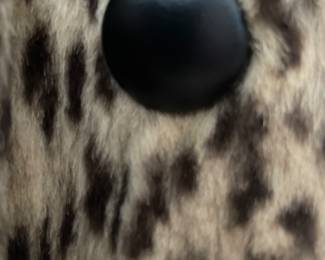 M/L size LEOPARD swing coat, hip length, 3/4 sleeves, MINK collar, leather cover double breasted buttons. From Caroline Wakefield estate. It has a FERISS Pensacola, FL label. BEAUTIFUL AND RARE. $5,000