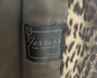 M/L size LEOPARD swing coat, hip length, 3/4 sleeves, MINK collar, leather cover double breasted buttons. From Caroline Wakefield estate. It has a FERISS Pensacola, FL label. BEAUTIFUL AND RARE. $5,000