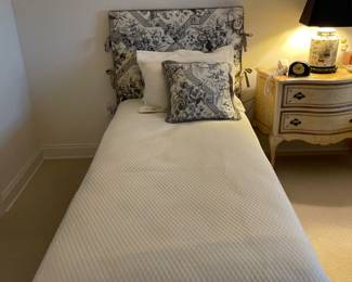 Pair of twin beds, black and white upholstery. $500 pair. Linen sold separately