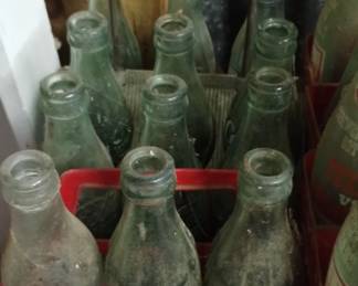 Vintage Coca-Cola bottles crates and metal crates