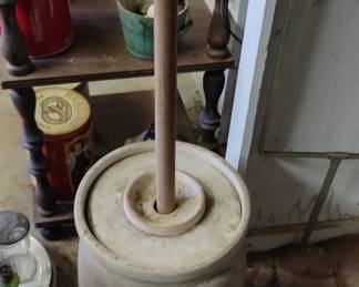 Butter churn with the handle
