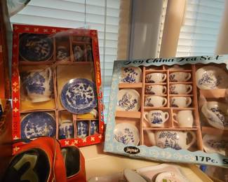 Children's tea sets still in the box.
