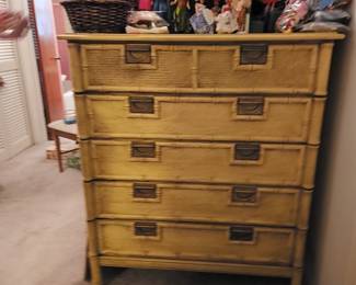 Chest of drawers that is part of bedroom suite #2.  Also, picture includes Barbie and other doll collection