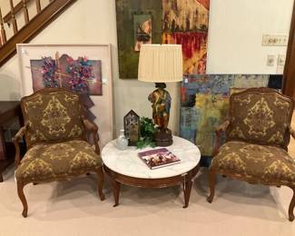 Matching chairs; another coffee table; lamp