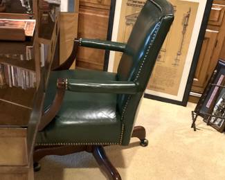 Handsome green leather desk chair with nailhead trim