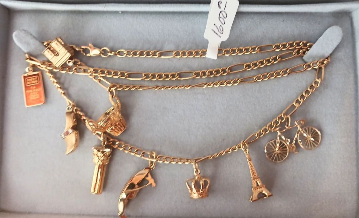 18k Gold Chain, Eight 14k Gold Charms, One 24k Gold Charm, Necklace.